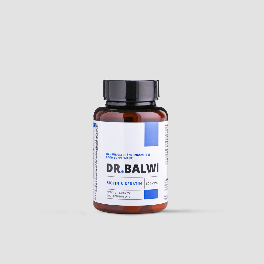 Eine braune Flasche mit schwarzem Deckel mit der Aufschrift „shop.elithairtransplant Biotin & Keratin Tabletten, unterstützt die Haargesundheit“, enthält 60 Tabletten und ist auf einem schlichten hellgrauen Hintergrund abgebildet.