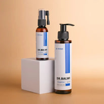 Zwei braune Flaschen des Dr. Balwi Shop Shampoo & Spray Sets stehen auf einem beigen Hintergrund - perfekt für die Haartransplantation Nachsorge und tägliche Haarpflege.